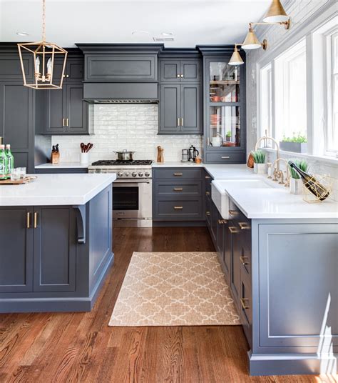 white navy blue kitchen cabinets.